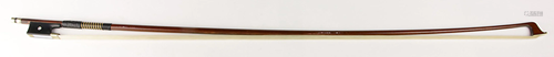 A violin bow stamped 