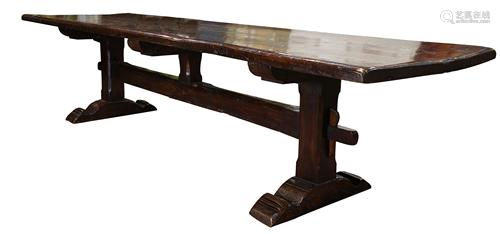 A Baroque style oak dining table