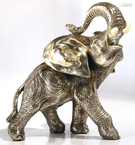 A silverplated model of an elephant