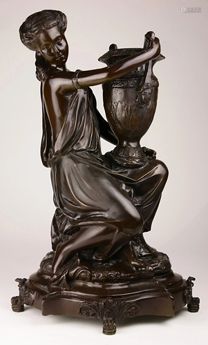 A patinated bronze figural sculpture after Auguste