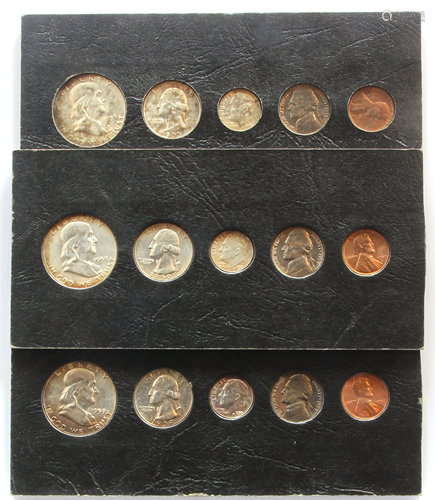 Three sets of uncirculated mint sets