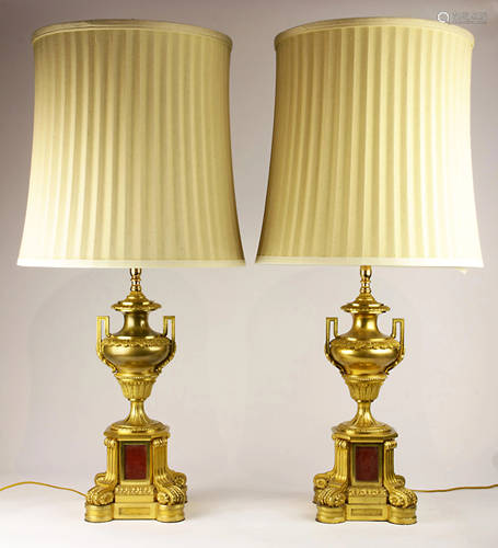 A Pair of French ormolu mounted urn form lamps