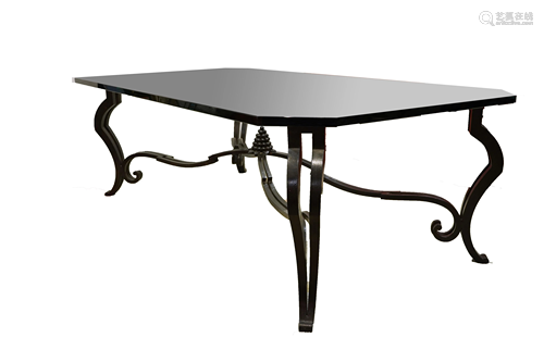 A Moderne wrought-iron glass top lower table