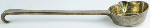 A Russian gilt .84 silver niello ladle