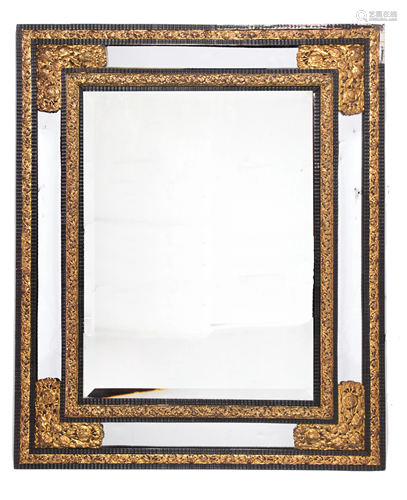 A Venetian etched and partial gilt looking glass