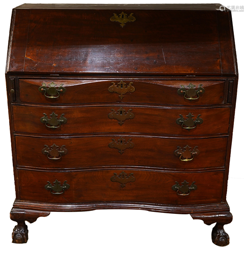 An American mahogany reserve serpentine desk