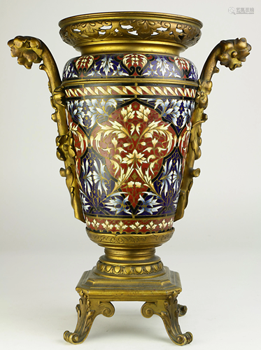 A Continental gilt bronze mounted champleve urn