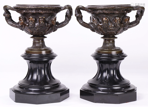 A pair of patinated bronze urns in the Renaissance