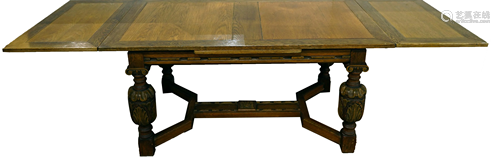 A Jacobean style draw leaf dining table