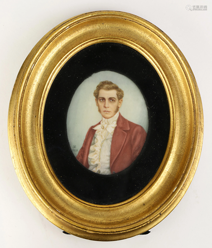 A framed miniature portrait of a gentleman