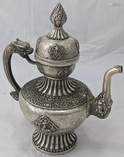 A large Tibetan or Himalayan white metal teapo…