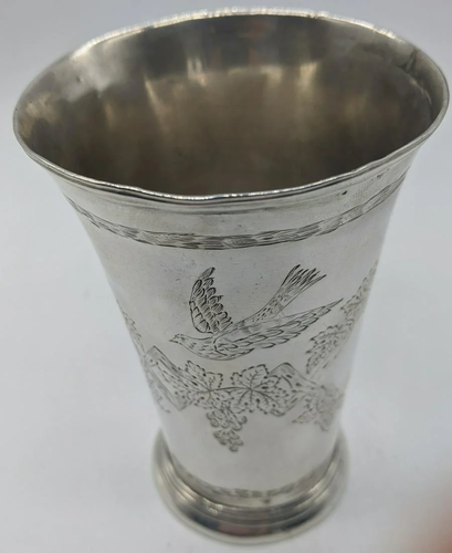 An 18th century French silver tumbler, etching with