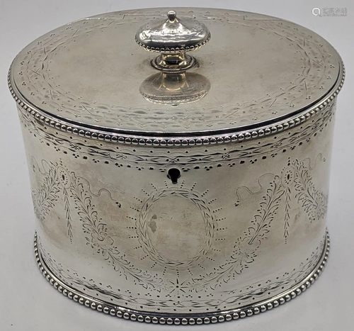 A Victorian silver tea caddy by Robert Harber, vacant