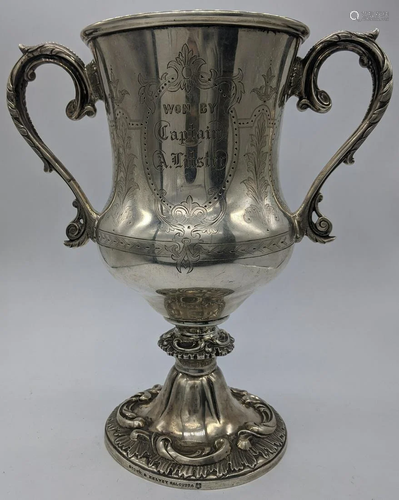 A twin handled silver cup by Cooke & Kelvey of