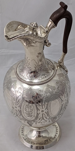 A large Victorian silver water jug by Gough & Silvester