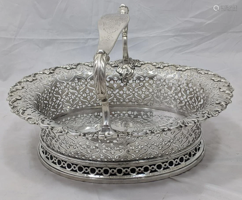 A George II silver cake basket by John Jacob, vacant