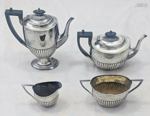 A Walker & Hall four piece silver tea service,