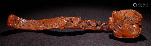 A HUANGYANG WOOD CARVED AUSPICIOUS RUYI