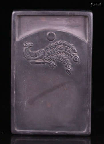 A STONE CARVED INK SLAB