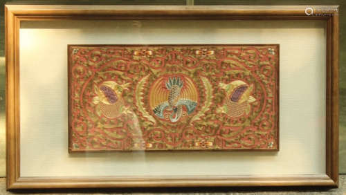 A RED EMBROIDERY WITH PHOENIX OUTLINE IN GOLD