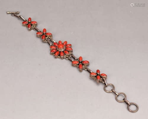 A SILVER CORAL BRACELET