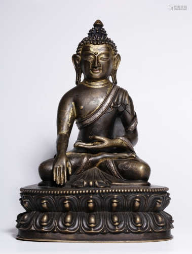 A SILVER SAKYAMUNI BUDDHA