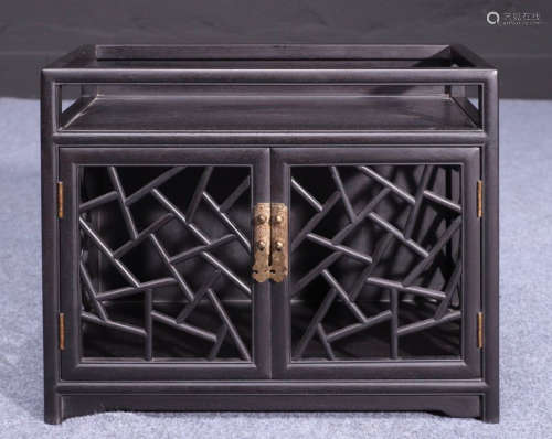 A ZITAN WOOD CARVED SHELF WITH ICE PATTERN