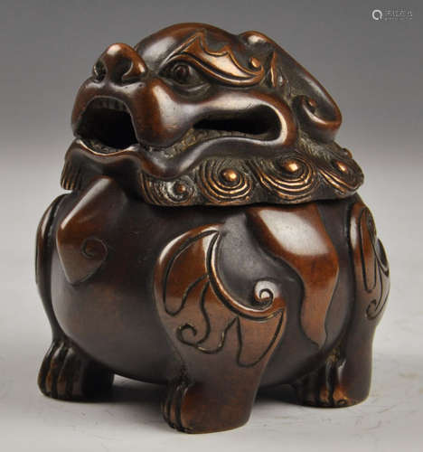 A COPPER CENSER CARVED WITH BEAST