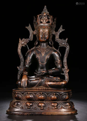 A SILVER SAKYAMUNI BUDDHA