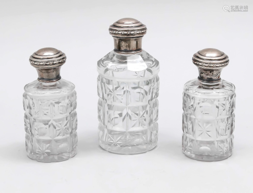 Three bottles with silver