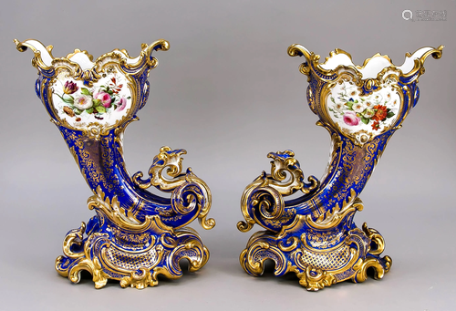 A pair of vases, matching