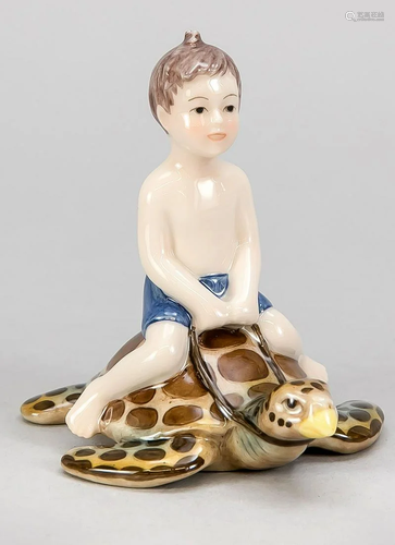 Boy riding a turtle, Roya