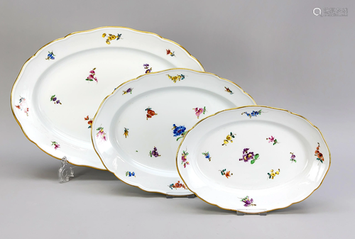 Three oval serving plates