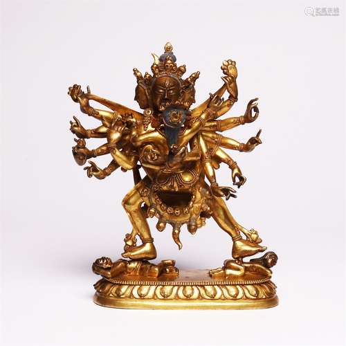 Bronze gilded eight arm Dharma protector