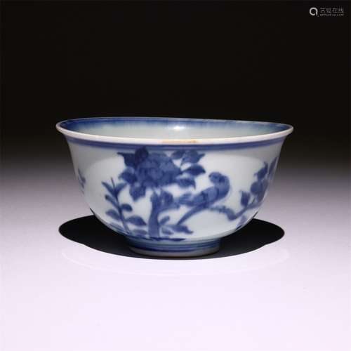 Bowl decorated with blue and white flowers and birds