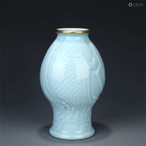 Qing Dynasty Qianlong year blue glaze gold painted carved fish pattern vase