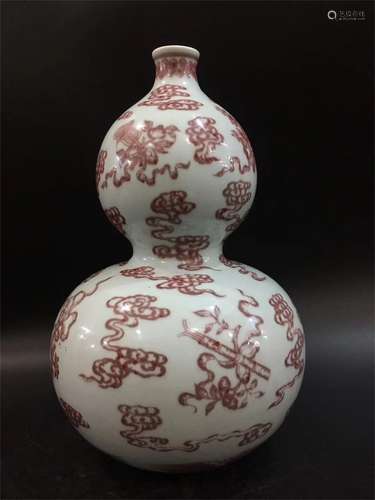 Eight immortals gourd bottle with red and dark glaze