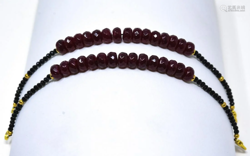 Pair of Carved Ruby Bead Bracelets w 80 Carats