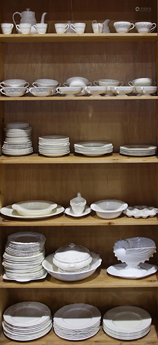 Six shelves of mostly Wedgwood Embossed Queens…