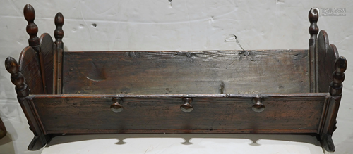 A Primitive carved wood crib