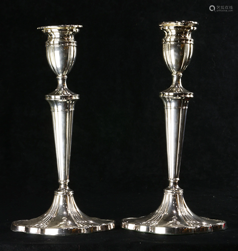 A pair of Sheffield silverplate candlesticks