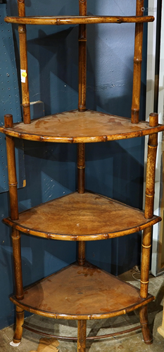 A bamboo and leather corner etagere