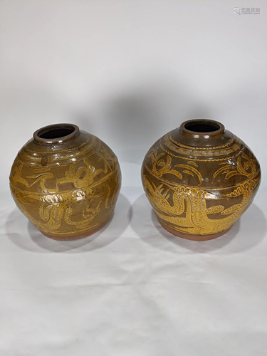 A group of Southeast Asian glazed pottery jars