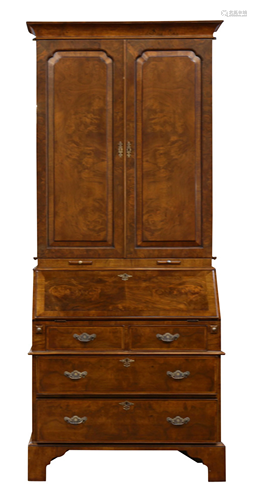 A George I style walnut bureau bookcase