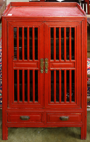 A Chinese paint decorated storage cabinet