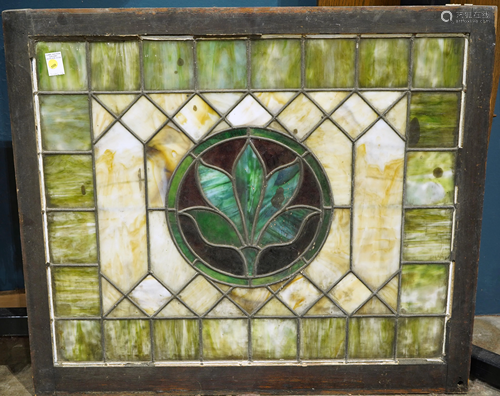 An Arts and Crafts leaded glass window panel …