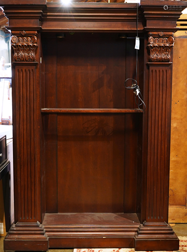 A pair of illuminated display cabinets in the