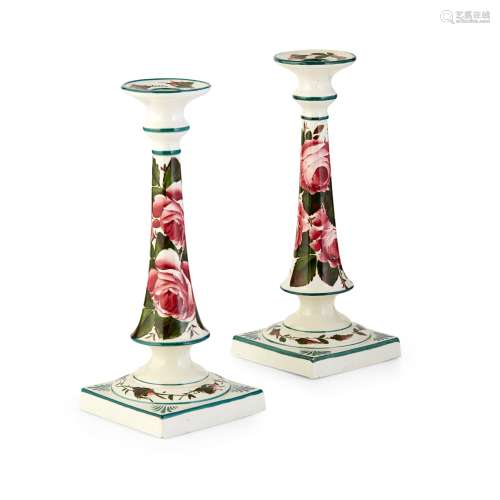 A PAIR OF WEMYSS WARE TALL SQUARE CANDLESTICKS ‘CABBAGE ROSES’ PATTERN, CIRCA 1900