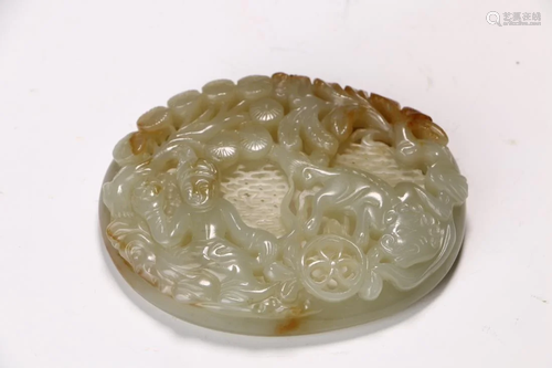 A JADE OPENWORK CARVING KIDS AND LION PE…