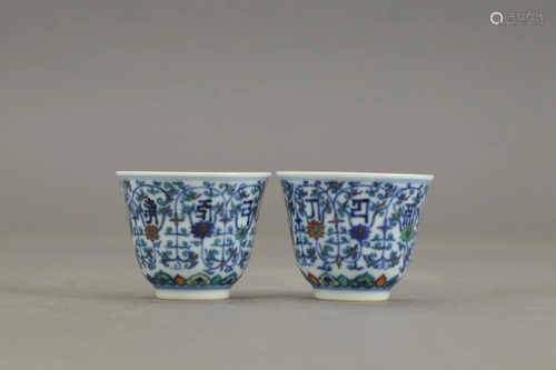 PAIR OF BLUE AND WHITE PORCELAIN CUPS